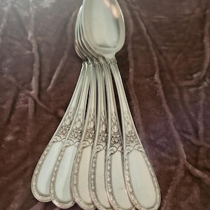 Small silver metal spoons