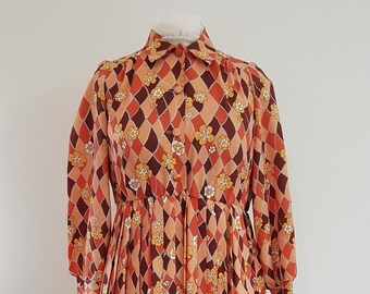 Vintage jaren '50 jaren '60 tinten oranje bloemen shirtwaist jurk, Maralece Australian Made, maat 14