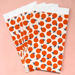 5x Sacchetti piatti / Sacchetti regalo in carta formato A6, set da 5 pezzi - rosa tenue con arance o clementine