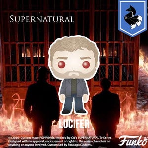 May include: A Funko Pop! vinyl figure of Lucifer from the TV series Supernatural, with a stylized design. The figure is in front of a fiery background with the word "LUCIFER" below it. The word "SUPERNATURAL" is at the top.