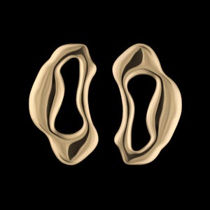 Bold sterling gold statement earrings with fluid organic shape — modern handmade jewelry inspired by ocean forms.