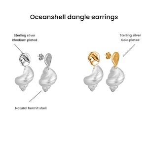 Pu&ograve; includere: Orecchini pendenti Oceanshell. Sono esposti due paia di orecchini. Un paio &egrave; in argento sterling, placcato rodio, e l'altro &egrave; in argento sterling, placcato oro. Entrambi i paia presentano un design a conchiglia naturale.