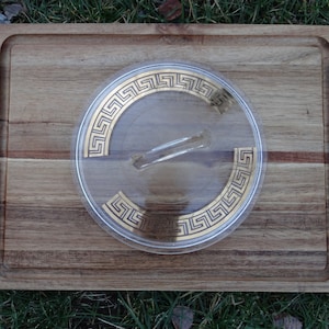Glass lid with grecian design, marked J2319