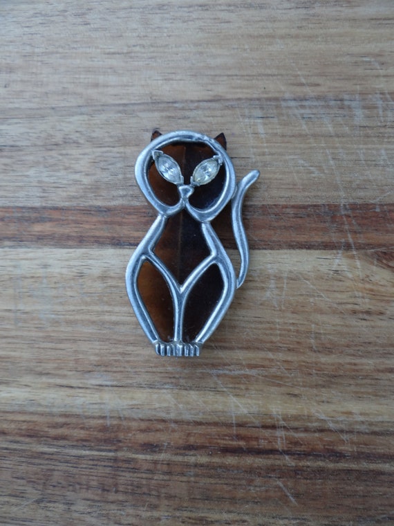 Silver and brown cat pin with shimmery eyes - image 1