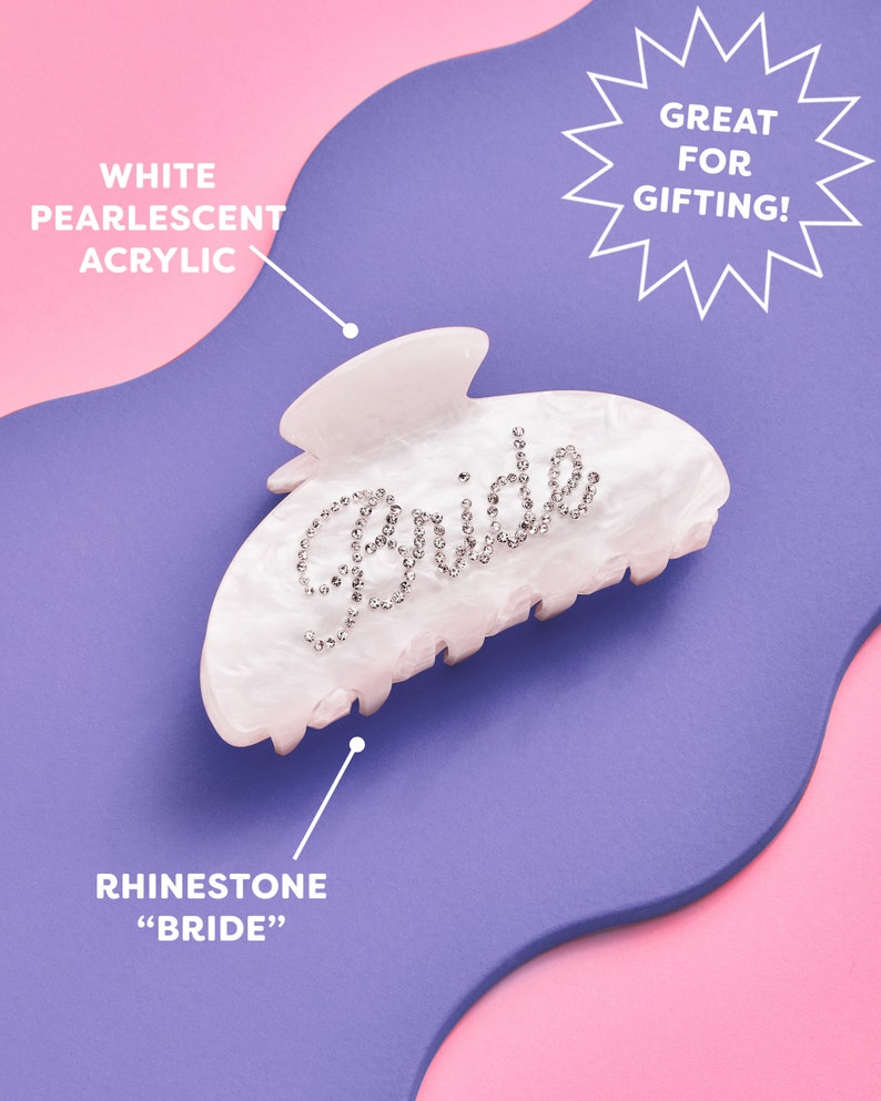 K&ouml;nnte beinhalten: Wei&szlig;er, perlmuttartiger Haarklaue aus Acryl mit einem Strass-Design "Bride".