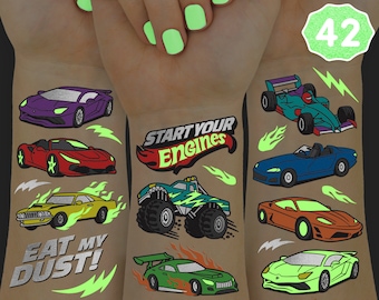 May include: A set of 42 glow-in-the-dark temporary tattoos featuring various car designs. The tattoos include a monster truck, a race car, a sports car, and a pickup truck. The tattoos are all black and white with neon green accents. The tattoos are perfect for adding a fun and unique touch to any outfit.