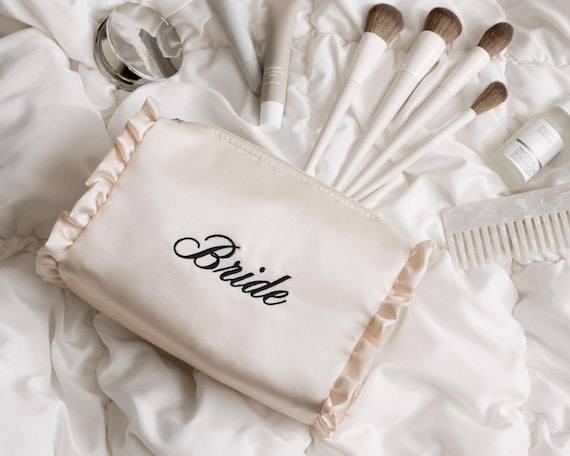 xo, Fetti Embroidered Bride Satin Ruffle Cosmetic Bag | Bride, Cosmetic Bag, Makeup Bag, Bridal Shower, Bachelorette Party, Wedding Gifts