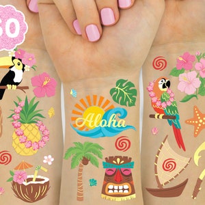 May include: 60 temporary tattoos featuring a tropical theme with images of pineapples, palm trees, toucans, parrots, hibiscus flowers, a tiki mask, a surfboard, a starfish, a fishing hook, and the word "Aloha".
