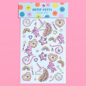 May include: A sheet of 35 sticker gems featuring unicorns, hearts, stars, rainbows, and wands. The stickers are in shades of pink, silver, and rainbow colors. The packaging has the text "PETIT FETTI" and "35 sticker gems" on a light blue background.