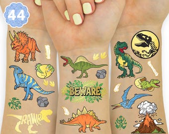 xo, Fetti tatouages temporaires de dinosaure - Feuille d'or, 44 pcs | Accessoires de fête d'anniversaire Jurassique pour enfants, cadeau d'anniversaire dinosaure, décorations fossiles T-Rex