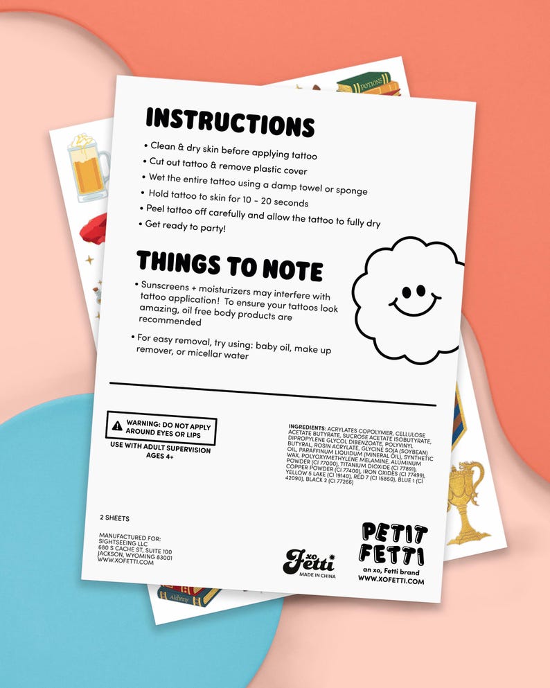 May include: A white sheet with instructions for applying a temporary tattoo, including steps like wetting the tattoo and peeling it off. The sheet also includes a warning and a list of ingredients. The brand name "Petit Fetti" is visible.