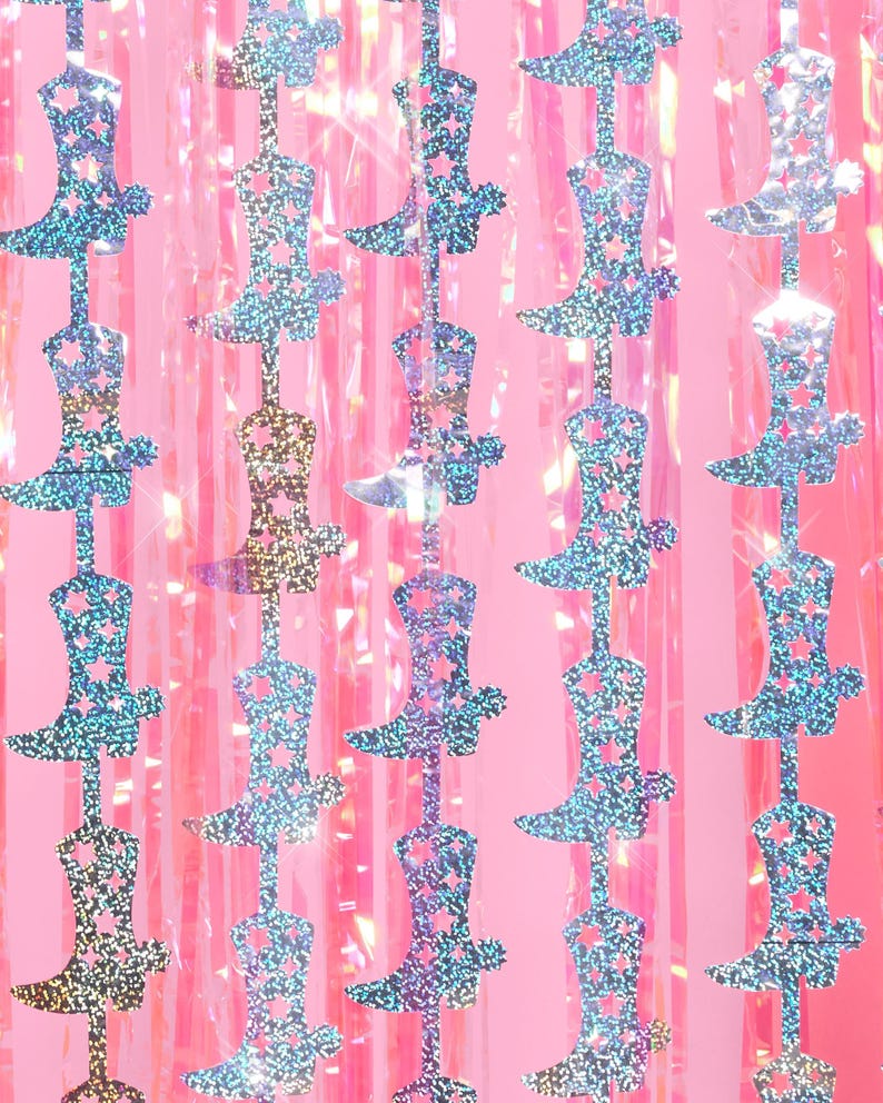 May include: A pink background with a repeating pattern of silver glitter cowboy boots. The boots are cut out and have a star design.