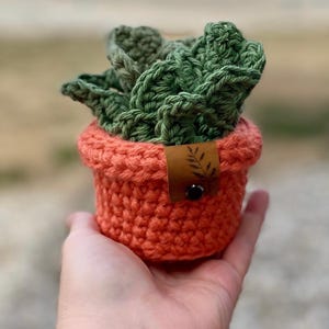 May include: A rustic wooden sign with the text "Welcome to our home" in a handwritten style. The sign features a distressed finish and a simple, inviting design, perfect for a front porch or entryway.