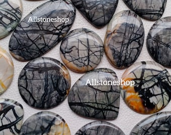 May include: A collection of 10 polished, natural, grey, black, and orange agate cabochons with a unique, dendritic pattern. The cabochons are all different shapes and sizes, and they are all polished to a high shine. Allstoneshop is printed on the image.