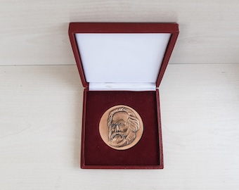 Metal table medal portrait of Karl Marx