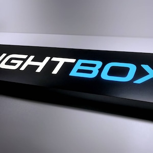 Custom light box sign, with your own text or logo. For interior display