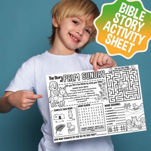 May include: A child holds a white Bible Story Activity Sheet featuring a Palm Sunday theme. The sheet includes a maze, word search, and word scramble, with illustrations of a donkey and palm branches. Text includes "Blessed is the..." and "How many donkeys do you see on this page?"