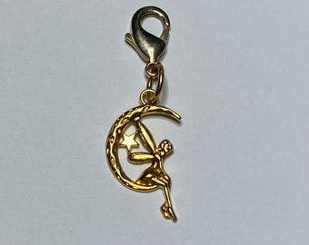 Charm with fairy on moon gold