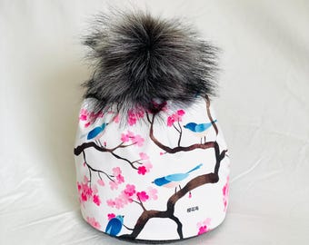 BIRDS in a CHERRY TREE- Alpine has a faux fur pompom or Nordic beanie style both 4 way stretch and lined with a light power stretch fleece.