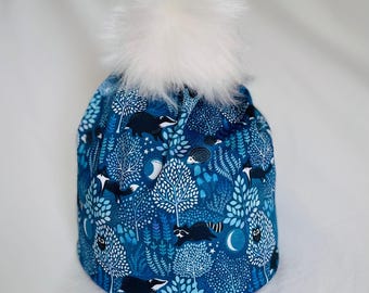 BADGERS, FOXES, RACOONS  Fun design in Alpine or Nordic style Hat in 4 way sport stretch, fleece ear band, and Pompom