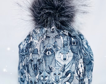 MOUNTAIN FRIENDS Indigo & Pearl-Alpine or Nordic style Hat in 4 way sport lycra stretch, fleece ear band, and a Pompom