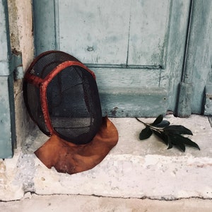 A fantastic Antique French fencing mask, a 19th century handmade fencing mask with leather padding - sporting memorabilia