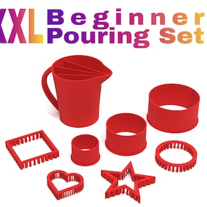 May include: A red plastic pouring set with a pitcher and various shapes, including a circle, square, star, heart, and a ring. The set is labeled "XXL Beginner Pouring Set".