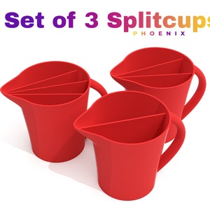 May include: Set of three red plastic split cups with handles. The cups are divided into sections. The cups are labeled "Splitcups Phoenix".