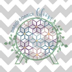 May include: A green wreath with leaves surrounds a circle with a geometric pattern of blue, purple, pink, and yellow flowers. The text "BIBBIDI BOBBIDI bloom" is written around the circle.