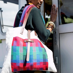 Eye catching colourful tote bag with beautiful handwoven front pocket real leather straps and unique leather fastener