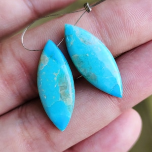 One Matched Pair Blue Mohave Turquoise Smooth With Flat Back Marquise Shape Cabochon Side To Side Drilled