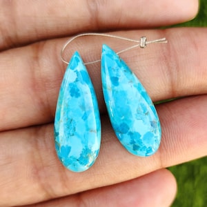 One Matched Pair Blue Mohave Turquoise Smooth With Flat Back Pear Shape Cabochon Side To Side Drilled