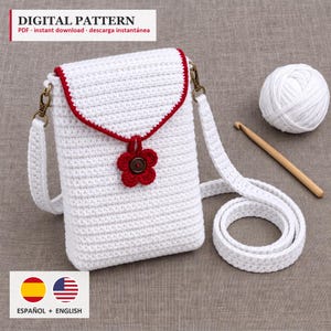 May include: A white crochet crossbody bag with a red trim on the flap, a red flower-shaped button closure, and a matching white strap. The text DIGITAL PATTERN PDF - instant download - descarga instantánea is visible at the top of the image.