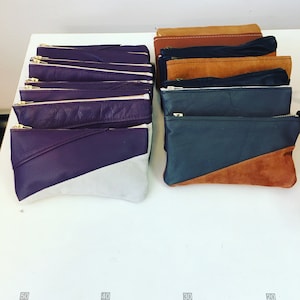 Pencil cases in leather and suede