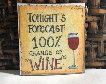 May include: A yellow and brown sign with the text "Tonight's Forecast: 100% chance of Wine" and a cartoon illustration of a glass of red wine.