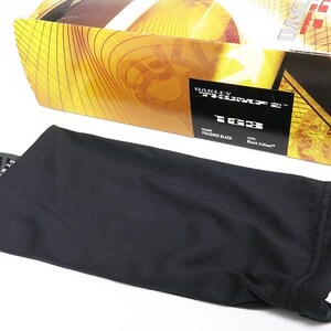 May include: An unopened box of Oakley sunglasses with a black microfiber bag and a small tag. The box has a gold and brown design. The tag and box indicate the sunglasses are "Polished Black" and "Black Iridium".