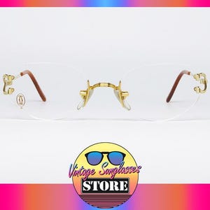 Vintage CARTIER 130 Rimless Oval Eyeglasses Gold C Decor Frames Made In France Cartier Eyewear Rimless oval-frame Glasses | Gold | FARFETCH main image 3