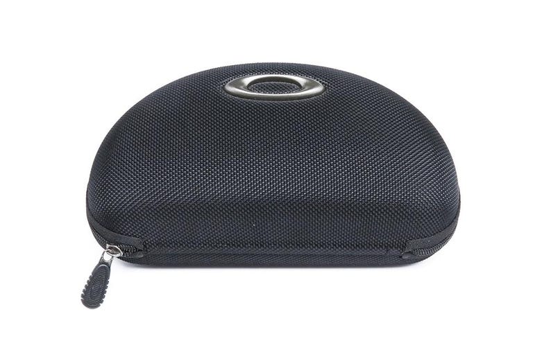 May include: A black zipped case for sunglasses with a silver metal ring on the top.