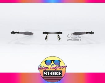 OAKLEY Soft Spike 4 11-803 TITANIUM original vintage Sport eyeglasses made in Japan 2003
