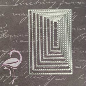 May include: A set of ten silver metal rectangular frames with a decorative stitched border. The frames are nested inside each other, with the smallest frame in the center.