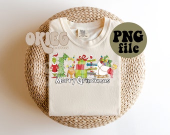 May include: A white t-shirt with a colorful graphic of the Grinch and his friends celebrating Christmas. The text "Merry Grinchmas" is printed below the graphic.