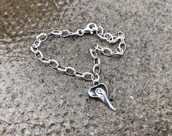What Lies Beneath - Sterling Silver Charm Bracelet.