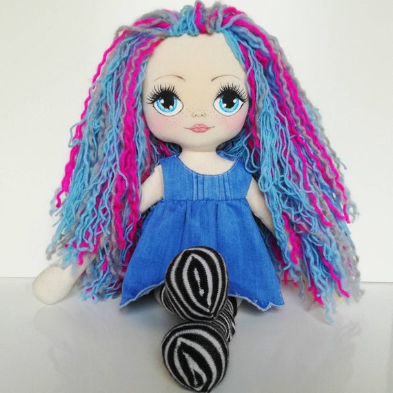 cara pintada de muñeca