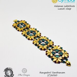 May include: A gold and green beaded bracelet with a Moroccan tile design. The bracelet is made with seed beads and features a gold clasp. The bracelet is labelled "Moroccan Tiles Bracelet" and "Adamas substitute Laouti clasp".