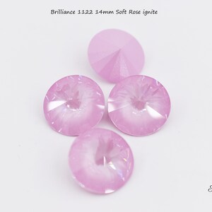 May include: Four pink 14mm round glass rhinestones with a pointed back. Brilliance 1122 Soft Rose ignite.