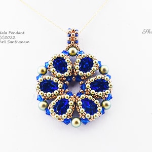 May include: A blue and gold beaded pendant necklace with a mandala design. The pendant is made with small blue and gold beads, and the necklace is made with a gold chain.