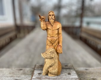 Freyr with a large elk antler and a bouquet of grain.