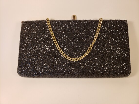 black glitter clutch