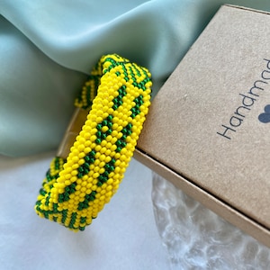 Pulsera de Ifa con signo odu Ogbe Tua