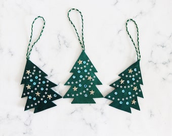 Three leather Christmas tree decorations